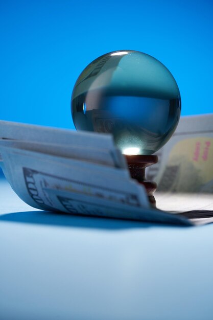 A close-up shot of a financial newspaper headline announcing the Federal Reserve's interest rate decision, with a magnifying glass highlighting the percentage increase.